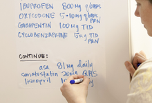 Close-up of Wizard Wall white film surface showing smooth dry erase writing area